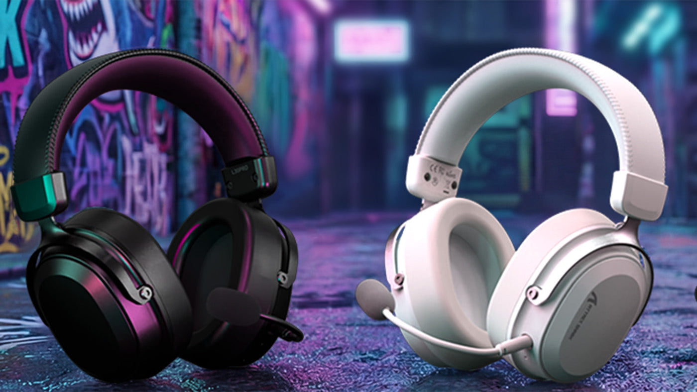Black and white wireless gaming headsets displayed on a desk with RGB lighting in the background