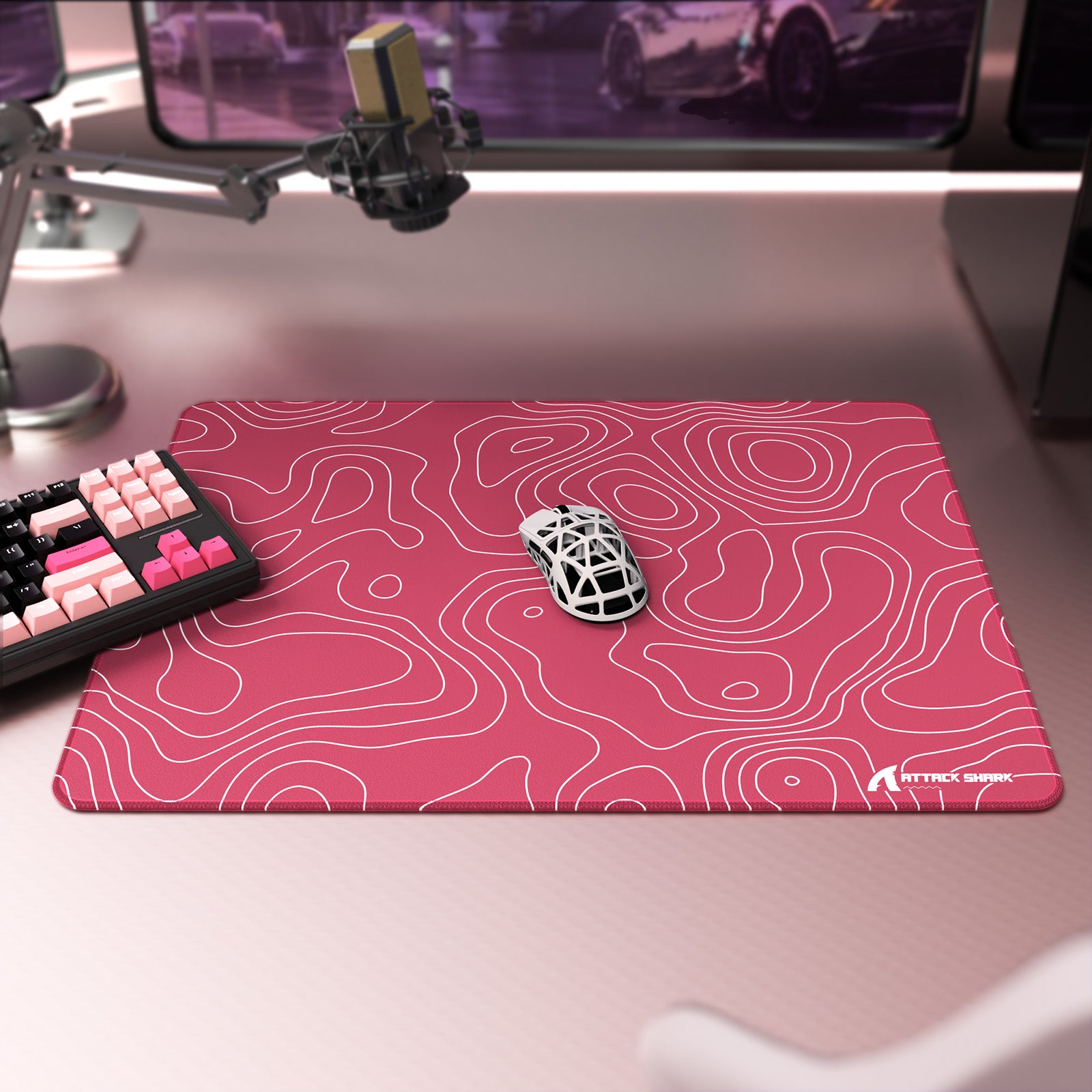 Pink ATTACK SHARK gaming mousepad with white contour lines, stitched edges, and anti-slip base